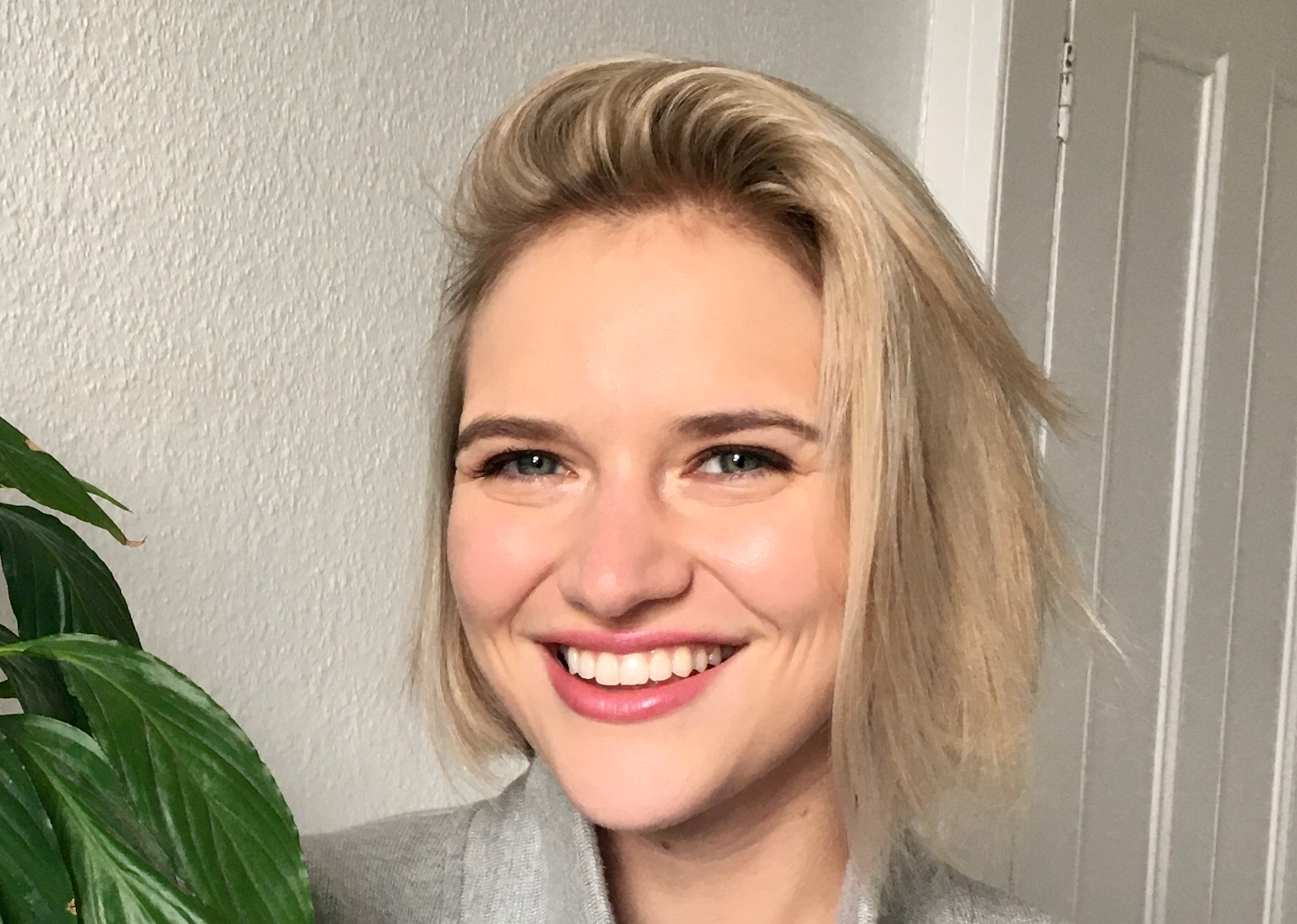 Image of Dr. Christine Slobogin, a white woman with chin length blond hair, smiling and wearing a gray blazer.