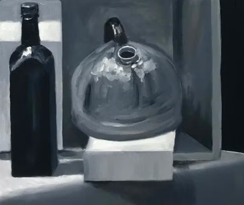 A still life in black and white, showing a tea kettle and a black bottle. 