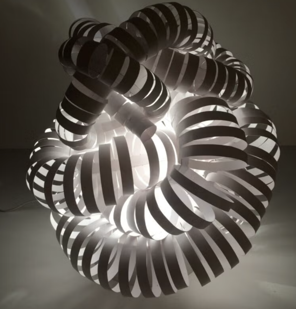 A paper lamp made of spirals of paper