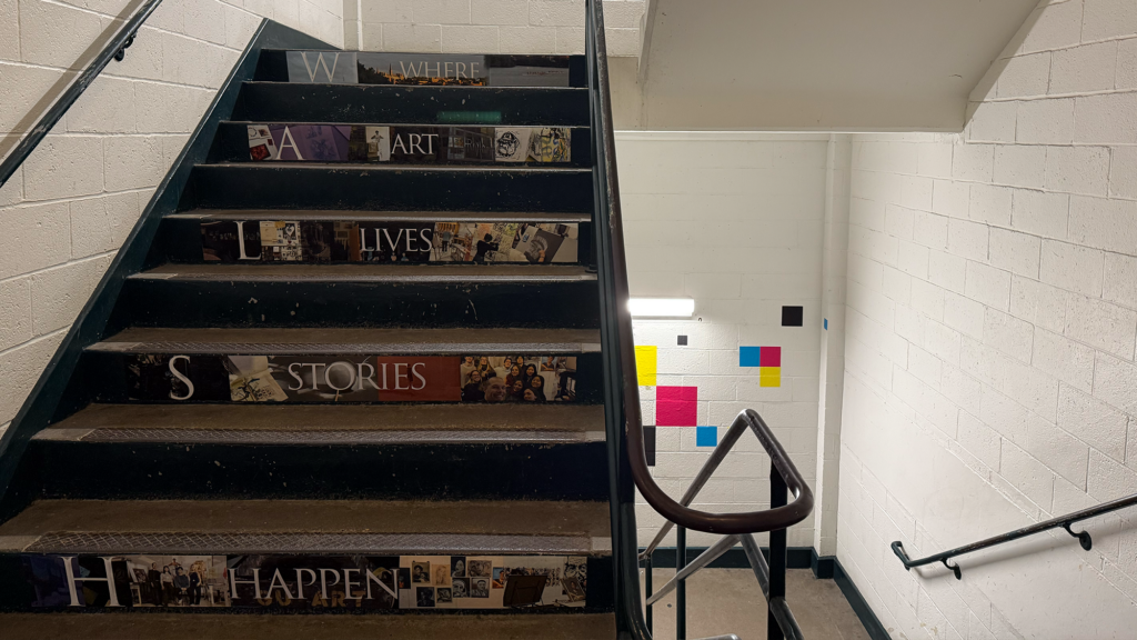 Second floor stairwell with student graphics